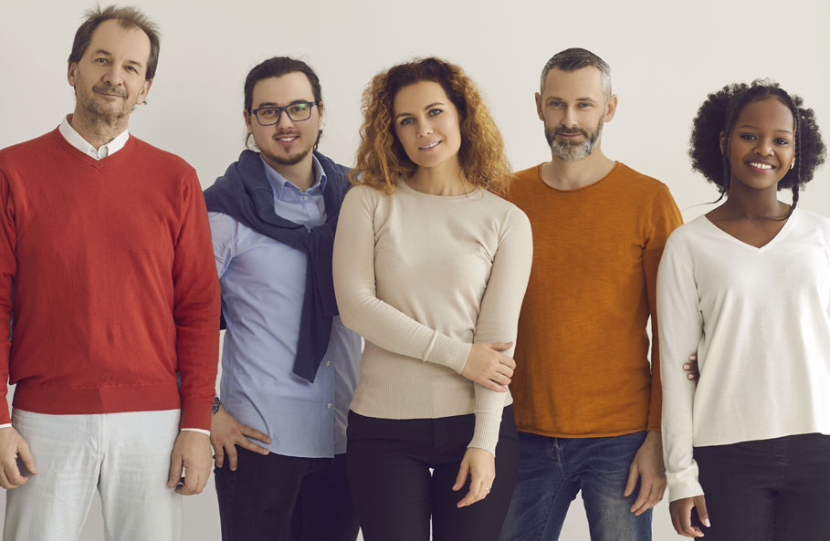 Front view of people smiling for a camera shot, group photo.